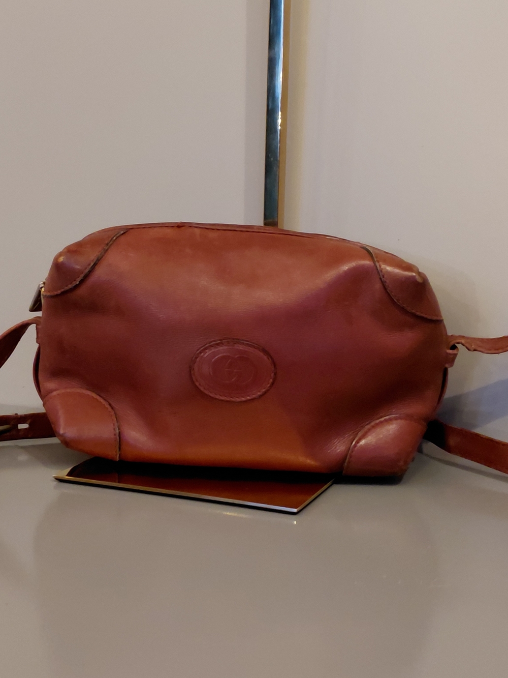 Gucci Brown Leather Crossbody with Embossed Oval Logo
